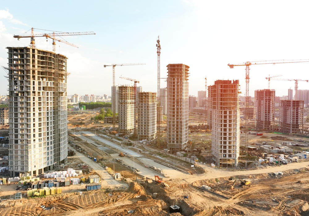 Construction,Crane,On,Housing.,Construction,Site,With,Buildings,Under,Construction.